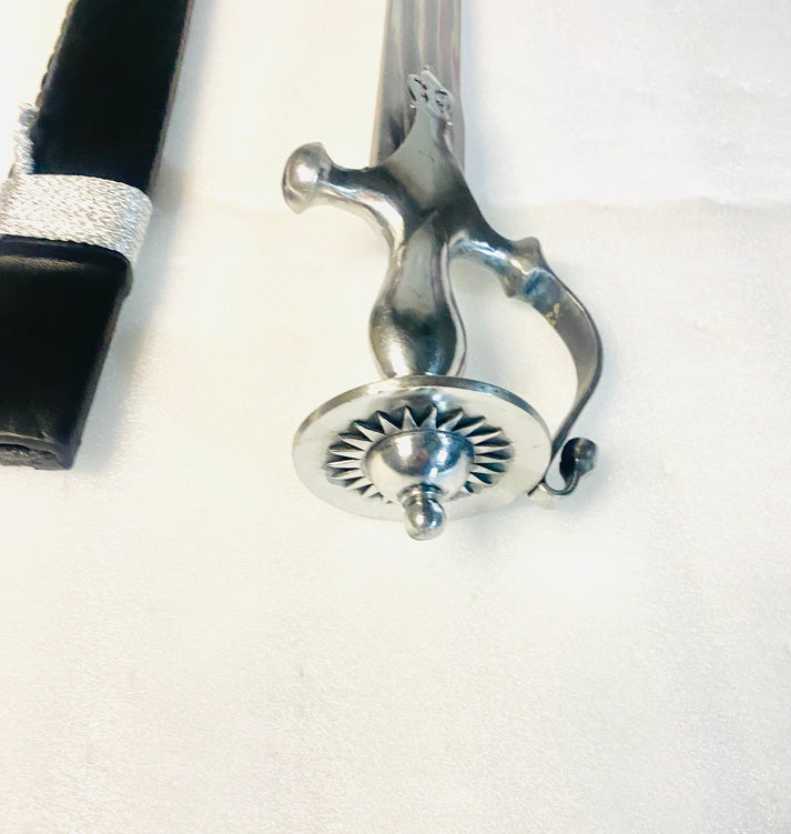 Sirohi with a flat, round top scabbard